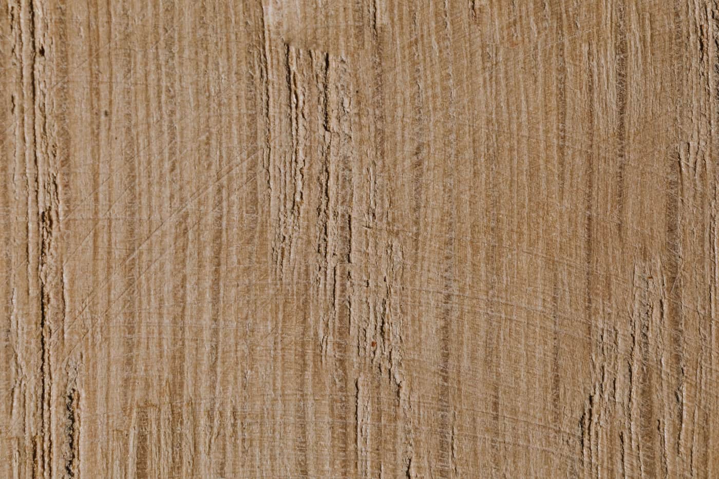 Close-up of solid oak wood grain on a furniture surface